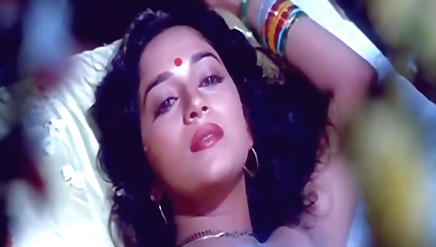 A hot brunette is in the bedroom and she is getting fucked