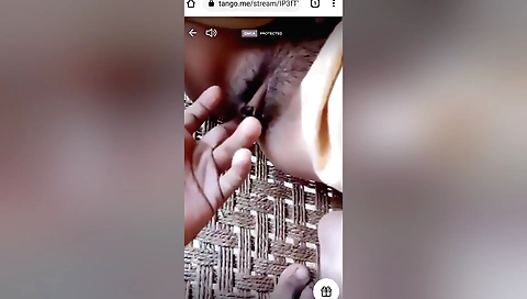 Amateur brunette is fingering her hairy pussy in hd video