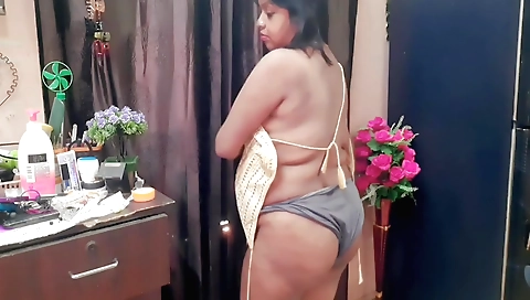 Indian chick wearing a sexy dress makes out with camera