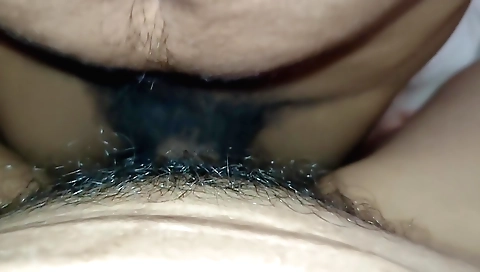 Asian girl riding a bike in sexy clothes and pants