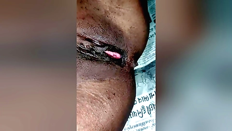 Indian hairy girl gets on her knees and puts her hairy pussy on