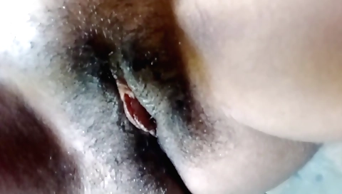 Hot slutty little babe stretches her pussy at home