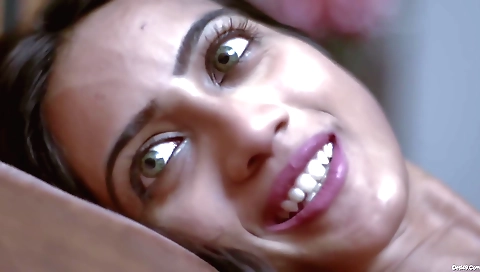 Slutty brunette takes a nap in bed in her sexy outfit