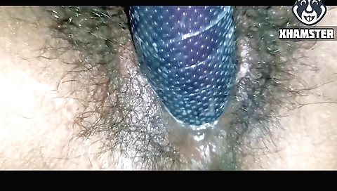 Horny babe in lingerie masturbates hairy pussy with dildo