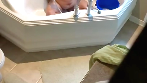 Indian woman in black dress showering and then solo