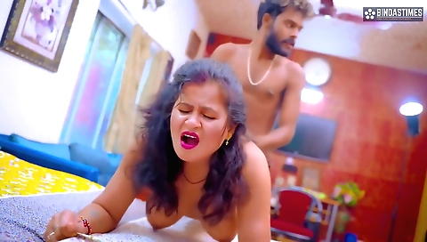 Busty indian milf fucked in her bed in a porn video
