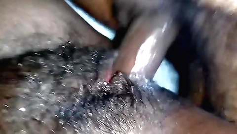 Indian girl with hairy pussy sucks a cock in the bedroom