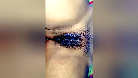 Hairy indian girl gets naked and gets her pussy wet