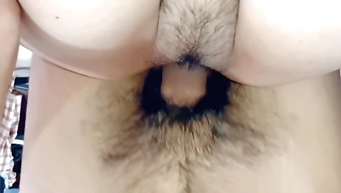 Indian hairy brunette babe in a pink dress with hairbrush