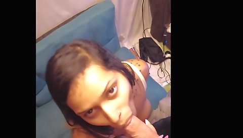 Indian beauty with a sexy face gives a blowjob to her boyfriend