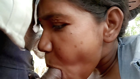 A girl in a sexy bra and boots getting naked and doing outdoor chores