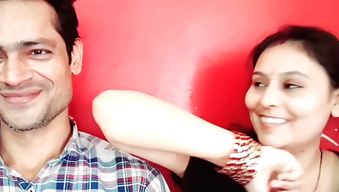 Indian teen with a plastic ball of a fish in her shorts