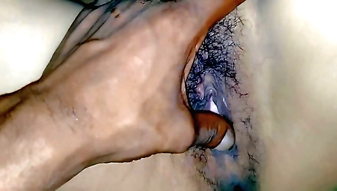 Hairy bhabhi rides a big cock in a tight black dress on sofa