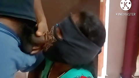 Brunette girl with a beautiful face is having oral sex