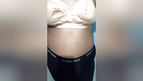 Mature brunette in a sexy outfit is naked on webcams