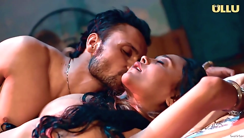 Brunette in a very hot dress dances with her boyfriend