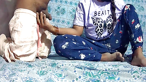 Handjob of a little girl in a pink bikini and a pink blouse