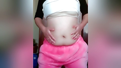 Chatty chick with a sexy blouse and skirt is masturbating