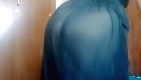 Indian chick in a sexy black dress is on her knees