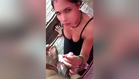 A horny brunette fingered by a dude in a blowjob video