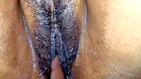 Indian wife with big hairy pussy in a fetish video