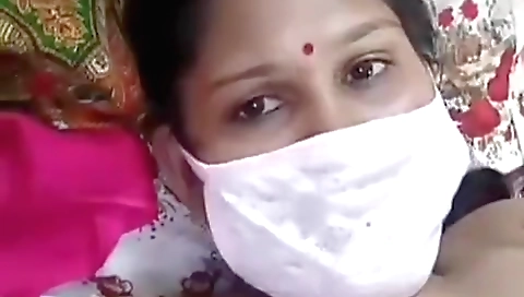 Buxom brunette with a sexy body shows off her curves