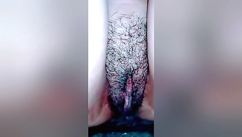 hairy pussy of a young Indian girl getting wet from sex